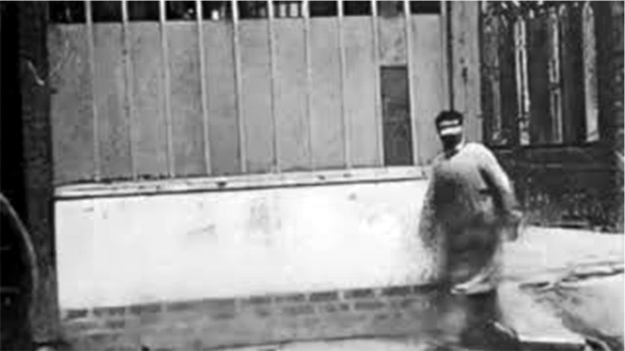 Man Walking Around a Corner