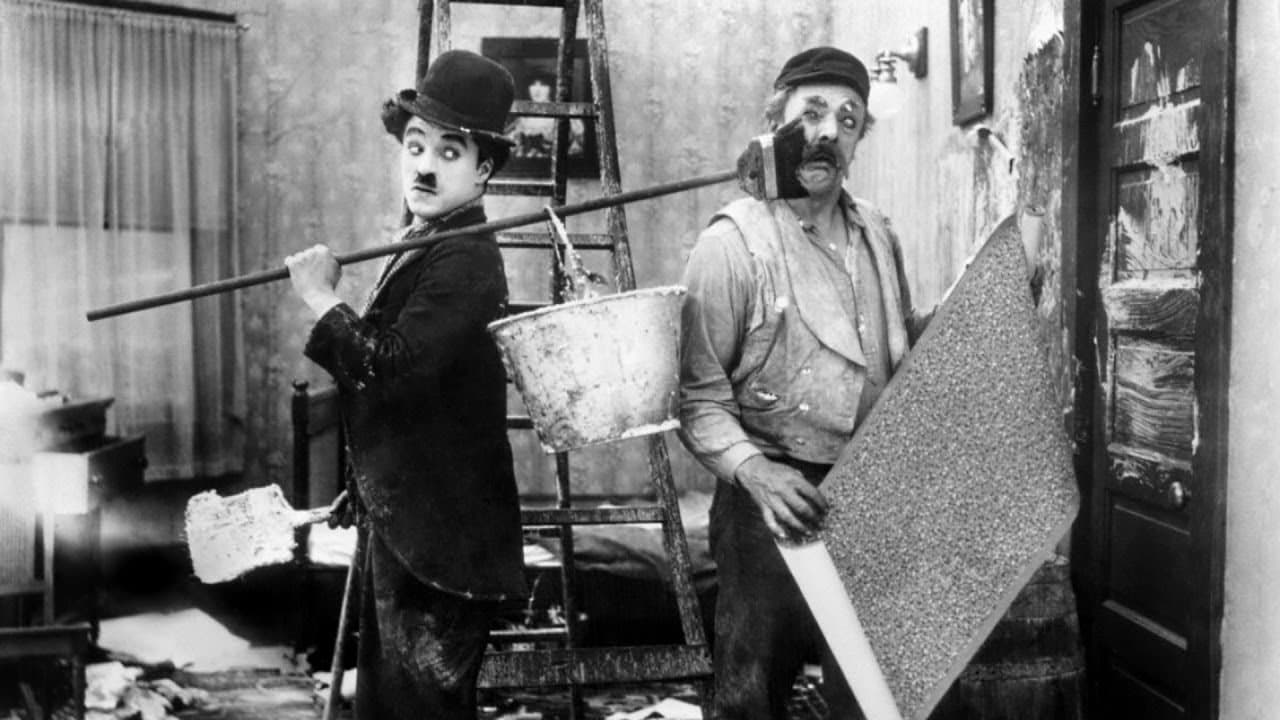 Charlot, trabajando de papelista